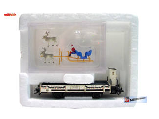 Marklin H0 48404 Lagenboord wagen beladen met een blauwe slee, de kerstman en twee rendieren. - Modeltreinshop